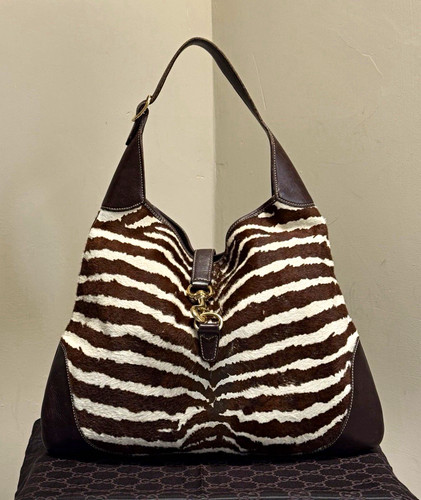Gucci brown zebra print pony - brown,